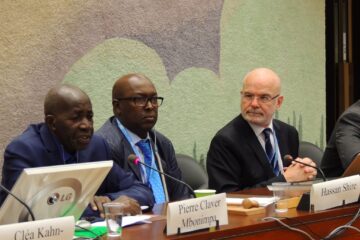 Three men with name tags