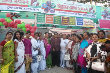 People standing in front of signs