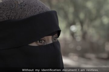 A woman telling about a life of the double registered